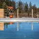 Timberra Naturpools mit Eisdecke im Winter